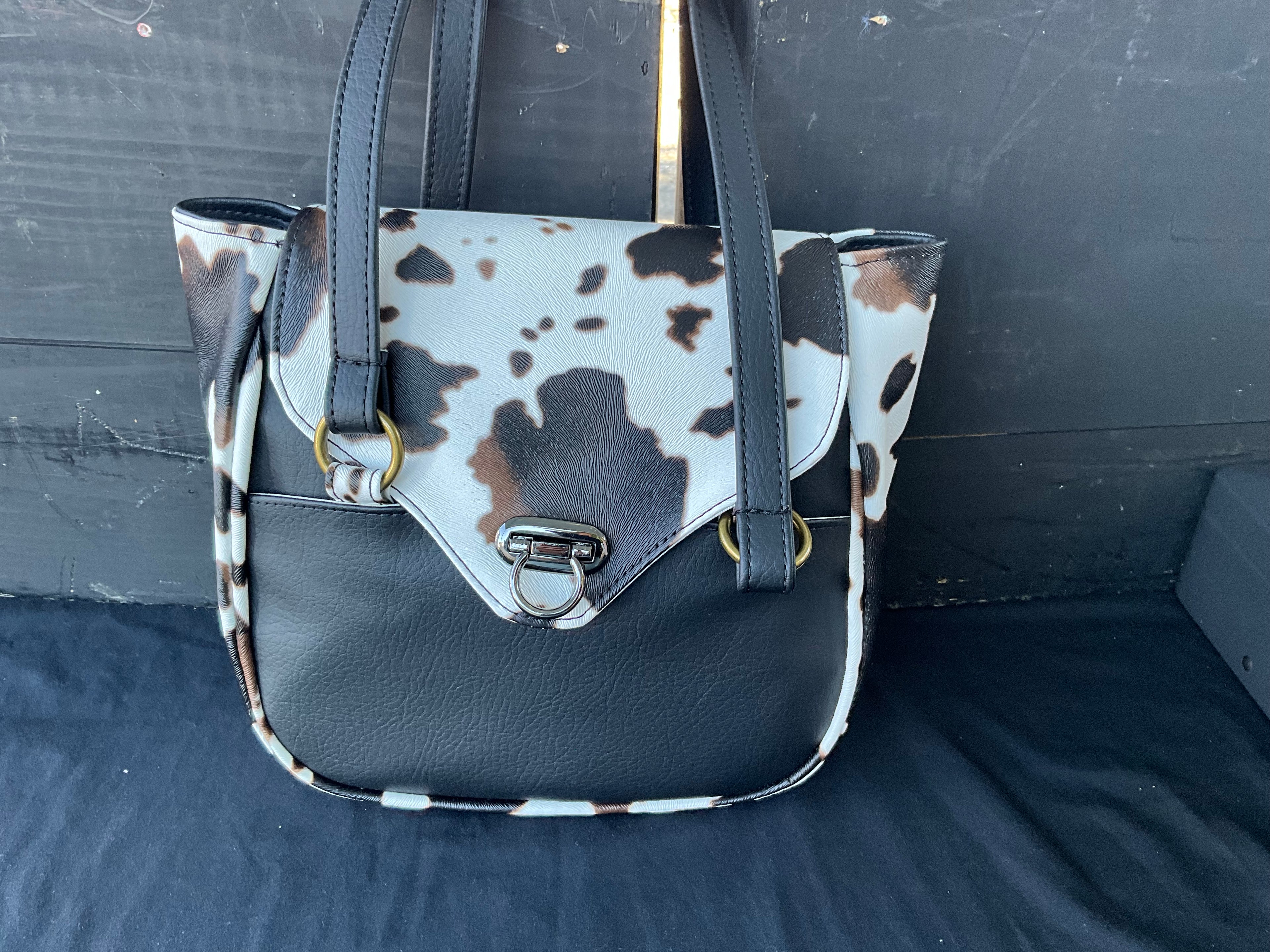 Cow hide shoulder bag